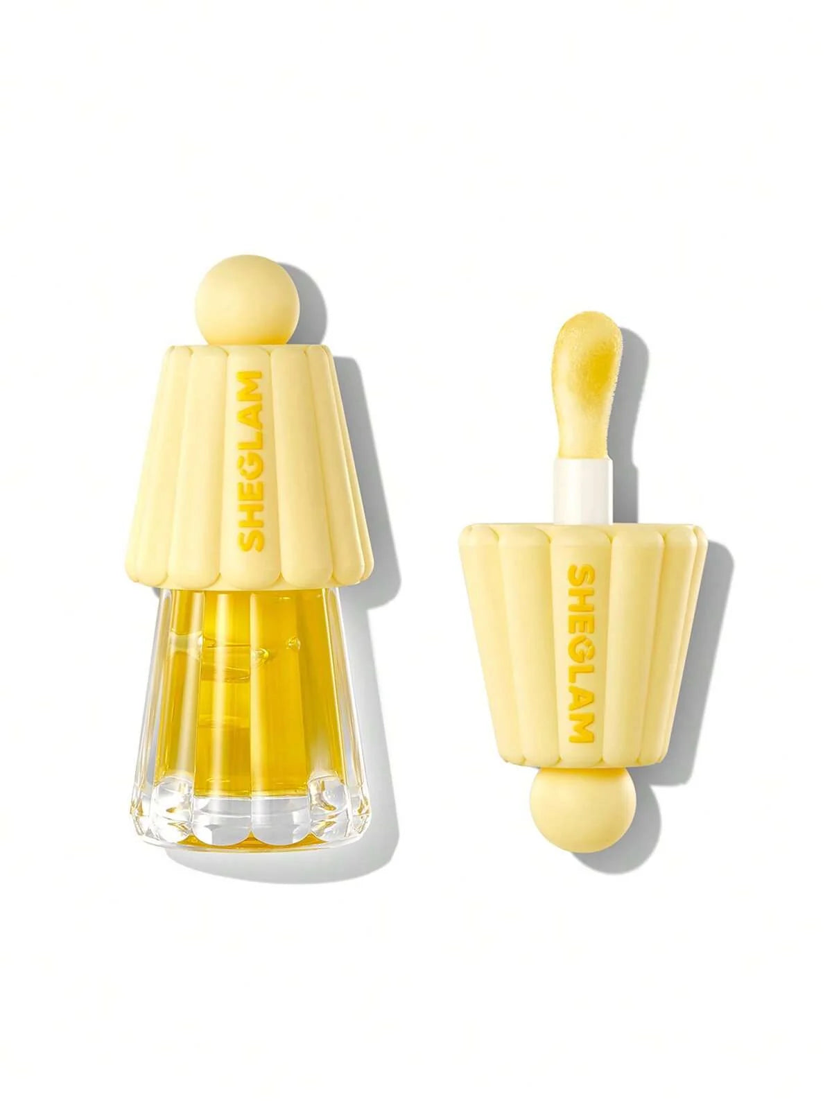 Sheglam nail polish with a yellow cap and clear body on a white background