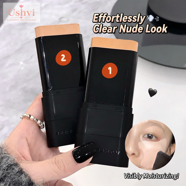 Two black makeup stick products labeled 1 and 2 are held in a hand, with text reading 'Effortlessly Clear Nude Look' and a small inset showing a face with makeup application. The brand name Ushvi is visible in the top left.