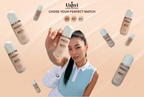 A woman in a light blue sleeveless top holds a bottle of Ushvi Geoharina Matte foundation against a warm beige background with floating bottles and the text 'CHOSE YOUR PERFECT MATCH' and shade numbers 03, 02, 01.