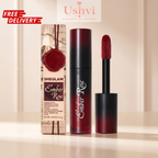 Sheglam Ember Rose nail polish shown with its retail box, the open bottle, and the applicator wand on a light beige background. The product features a deep berry-red color, and the packaging has a vintage paper design with a red wax seal.